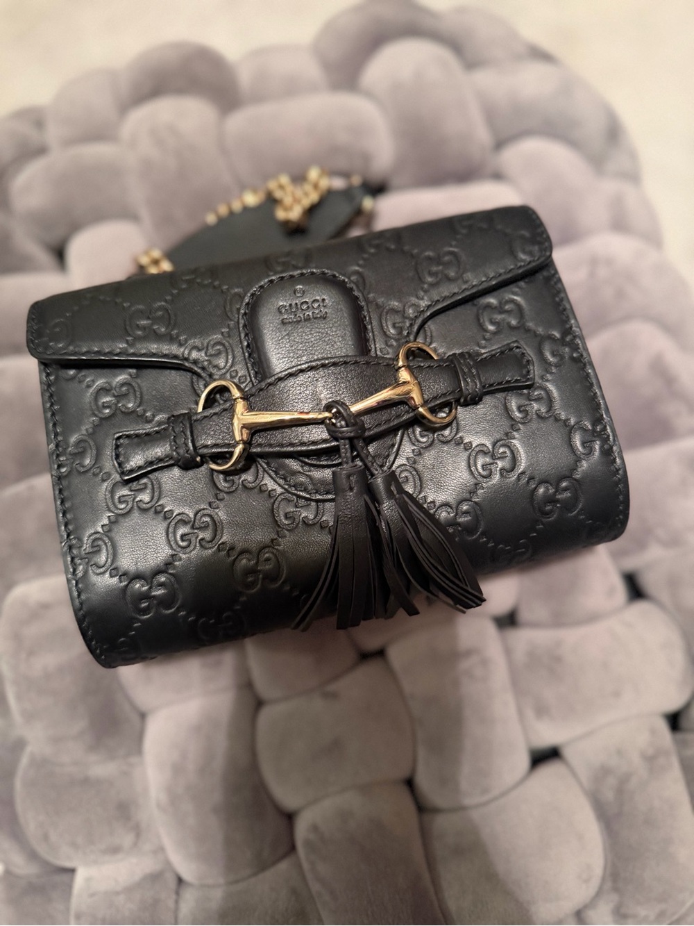 Gucci Black Embossed Leather Crossbody with Gold Horsebit and Tassel.